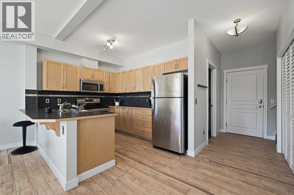 211 Aspen Stone Boulevard Southwest Property Photo 6