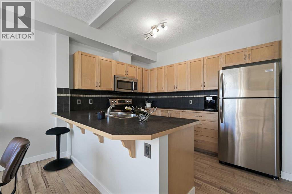 211 Aspen Stone Boulevard Southwest Property Photo 7