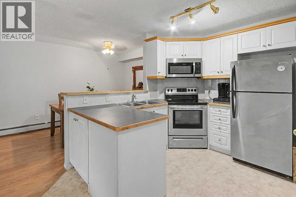 7724 Bowness Road Northwest Property Photo 5