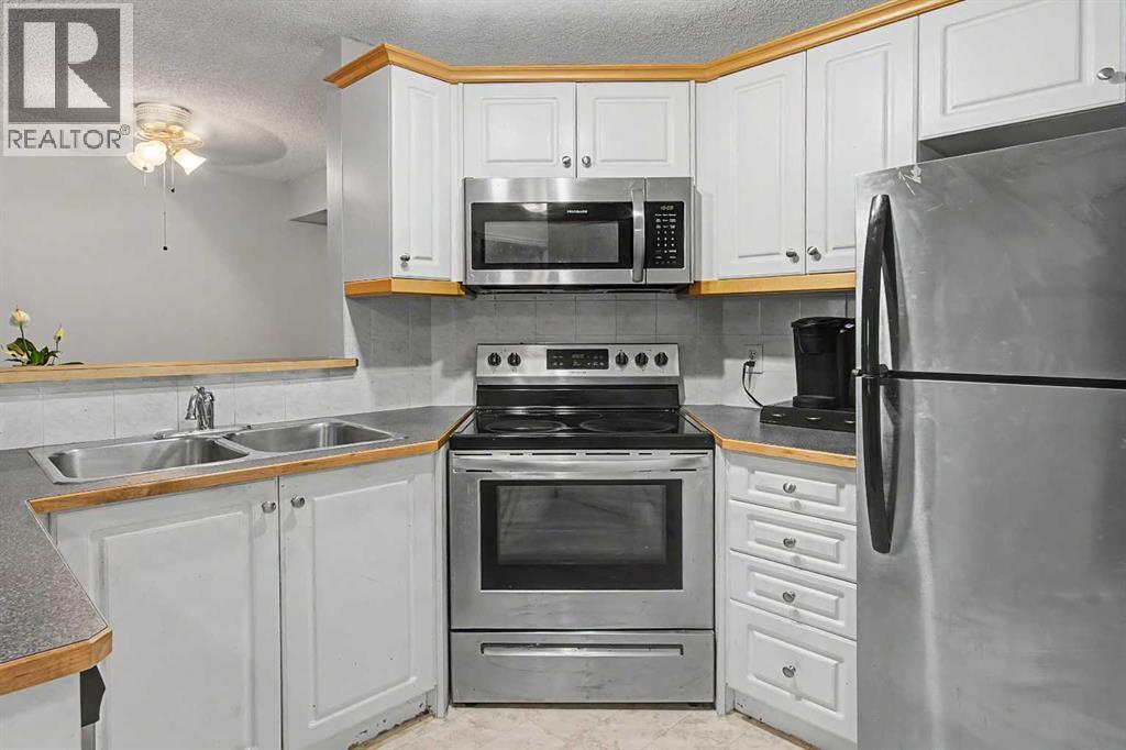 7724 Bowness Road Northwest Property Photo 6