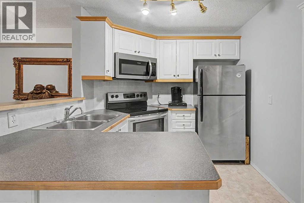7724 Bowness Road Northwest Property Photo 7