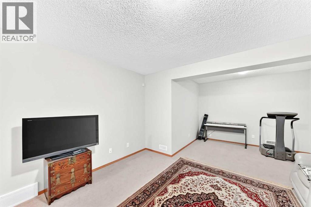 144 Cougarstone Common Sw Property Photo 35