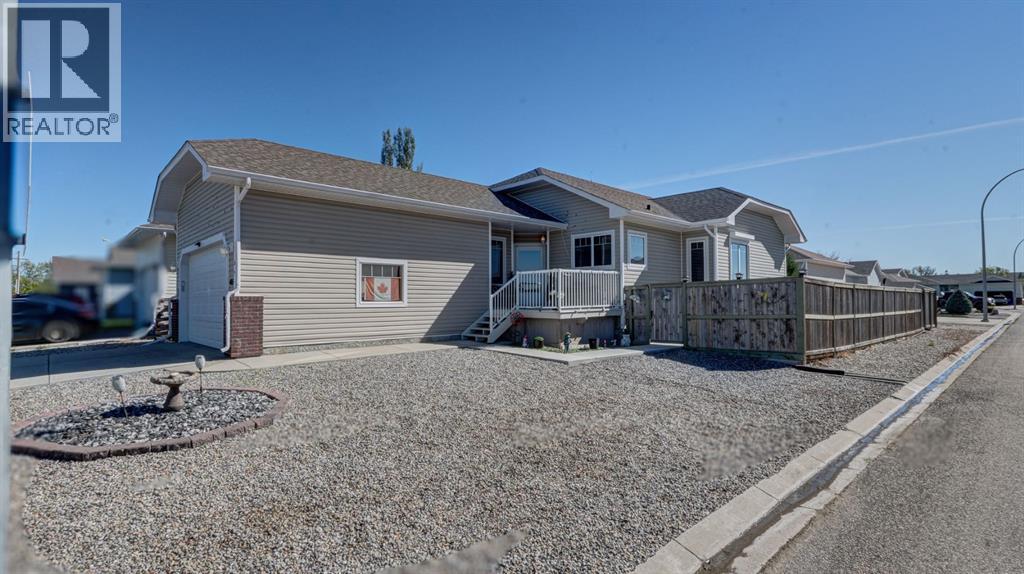 405 46 Avenue W Property Photo 1