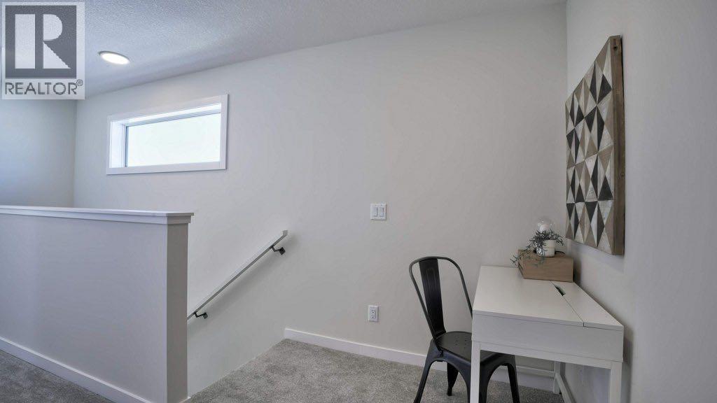 702 Wolf Willow Boulevard Se Property Photo 20