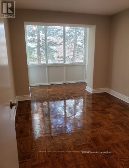 303 - 22 WOODLAWN AVENUE E Property Photo 1