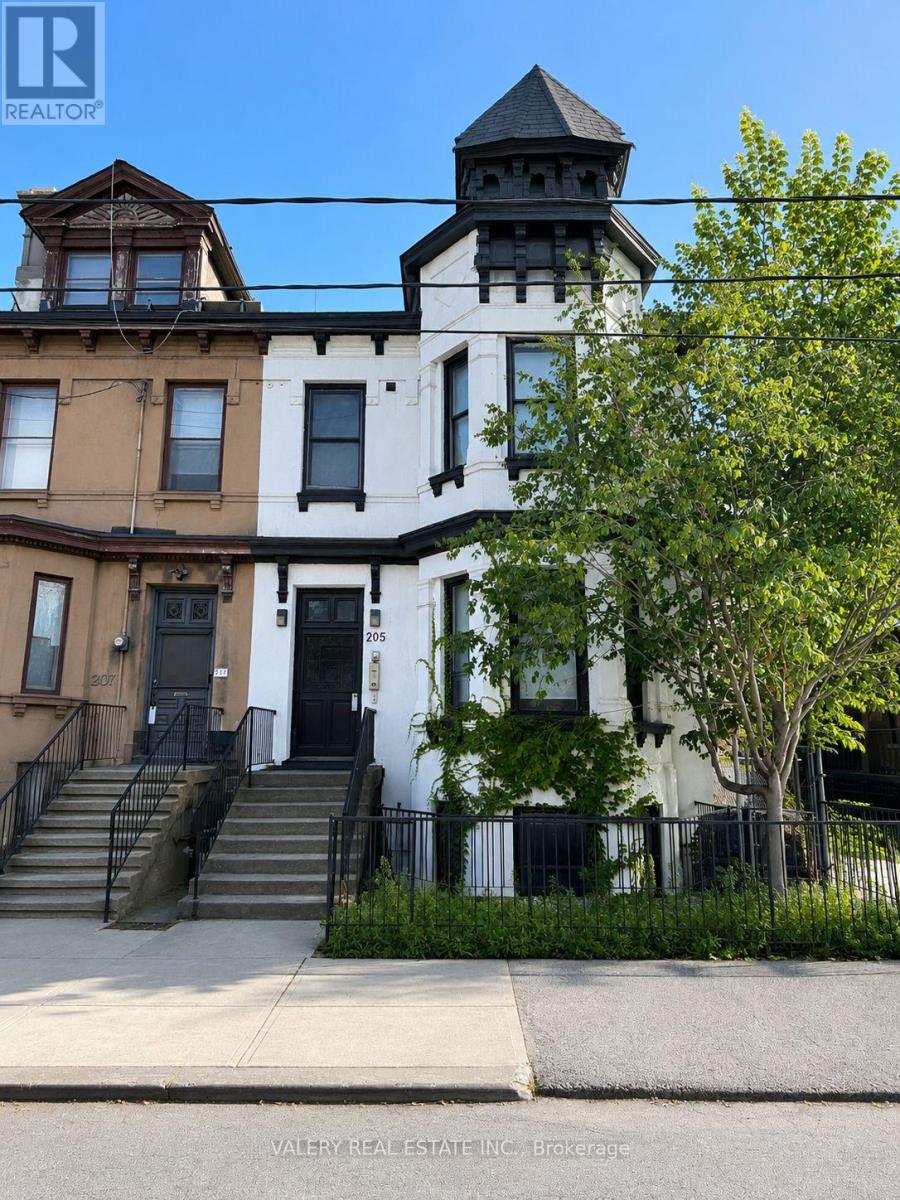 3 - 205 Gerrard Street E Property Photo 1
