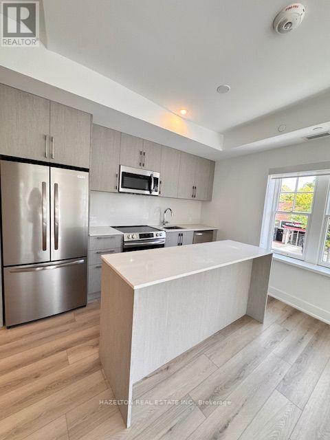 204 - 8 Manor Road W Property Photo 1