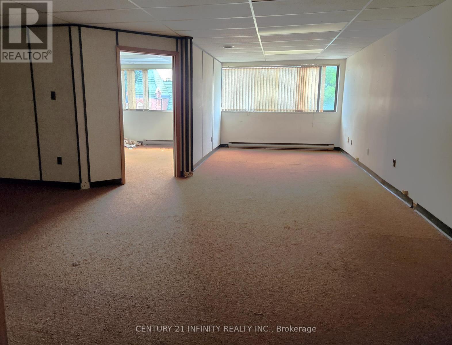 301 - 74 Simcoe Street S Property Photo 2