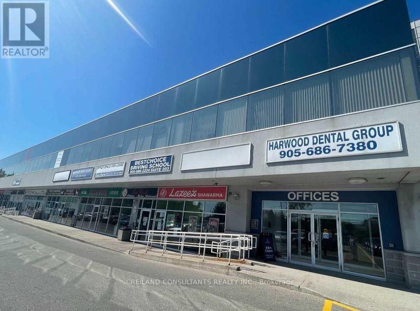 210 - 1 ROSSLAND ROAD W Property Photo 1