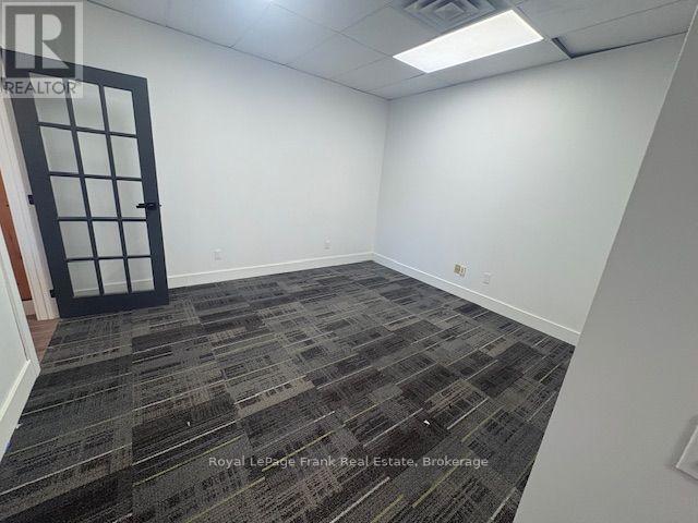 202 - 701 Rossland Road E Property Photo 2