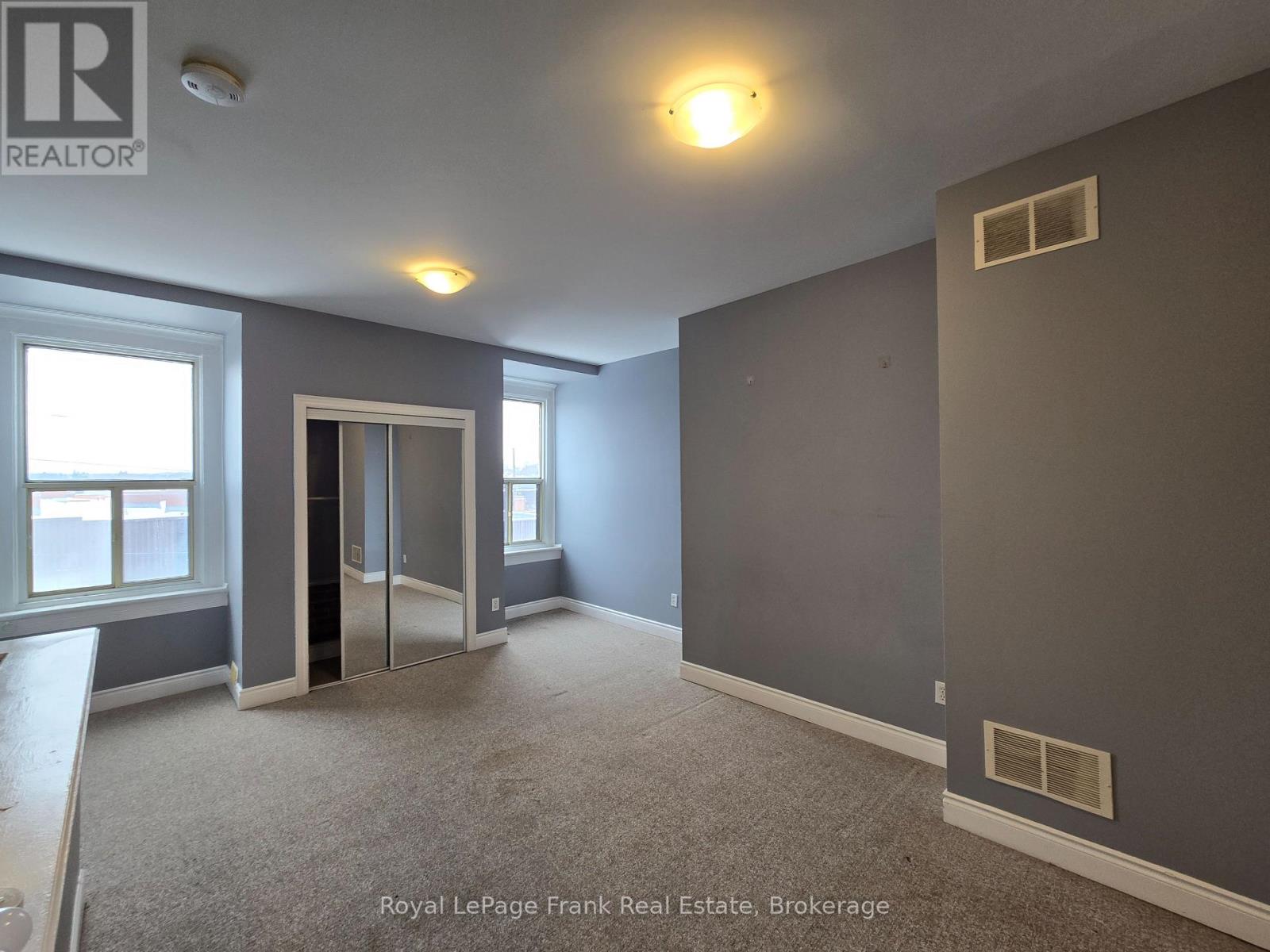 208 - 54 KING STREET E Property Photo 1