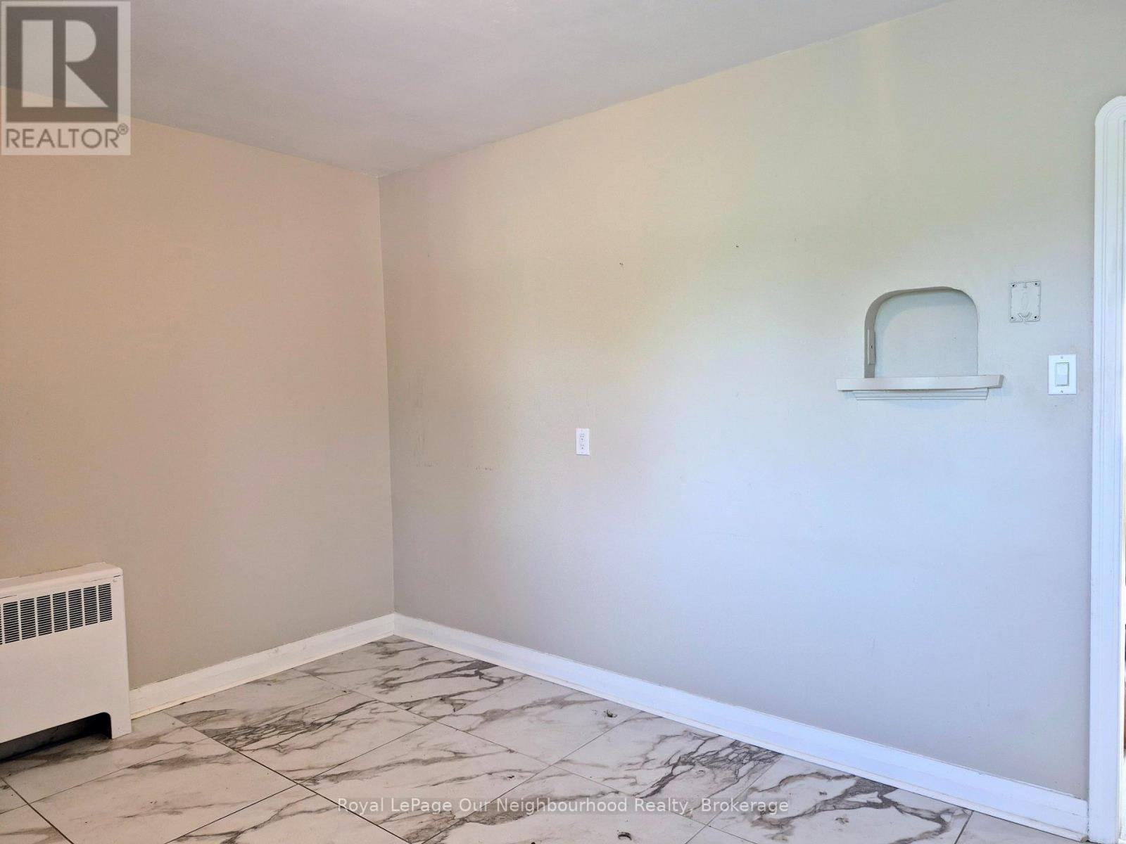 2 - 855 Simcoe Street N Property Photo 4