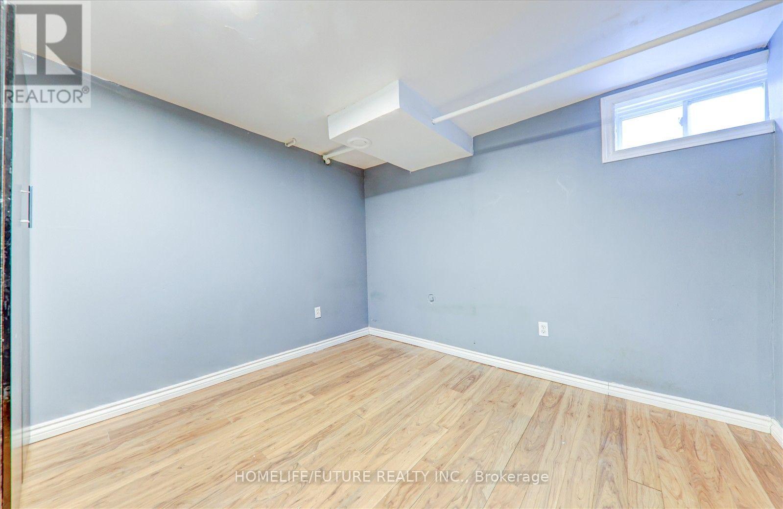 Bsmt - 97 Dunsfold Drive Property Photo 1