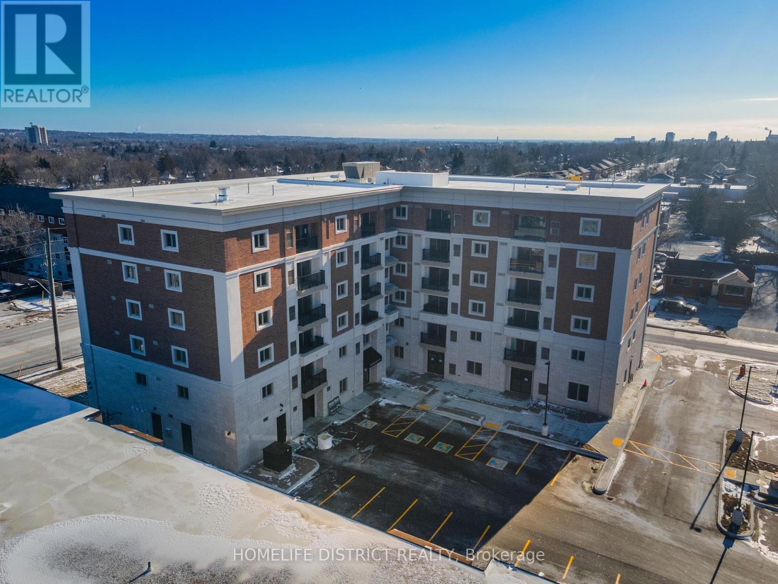 202 - 976 SIMCOE STREET N Property Photo 1