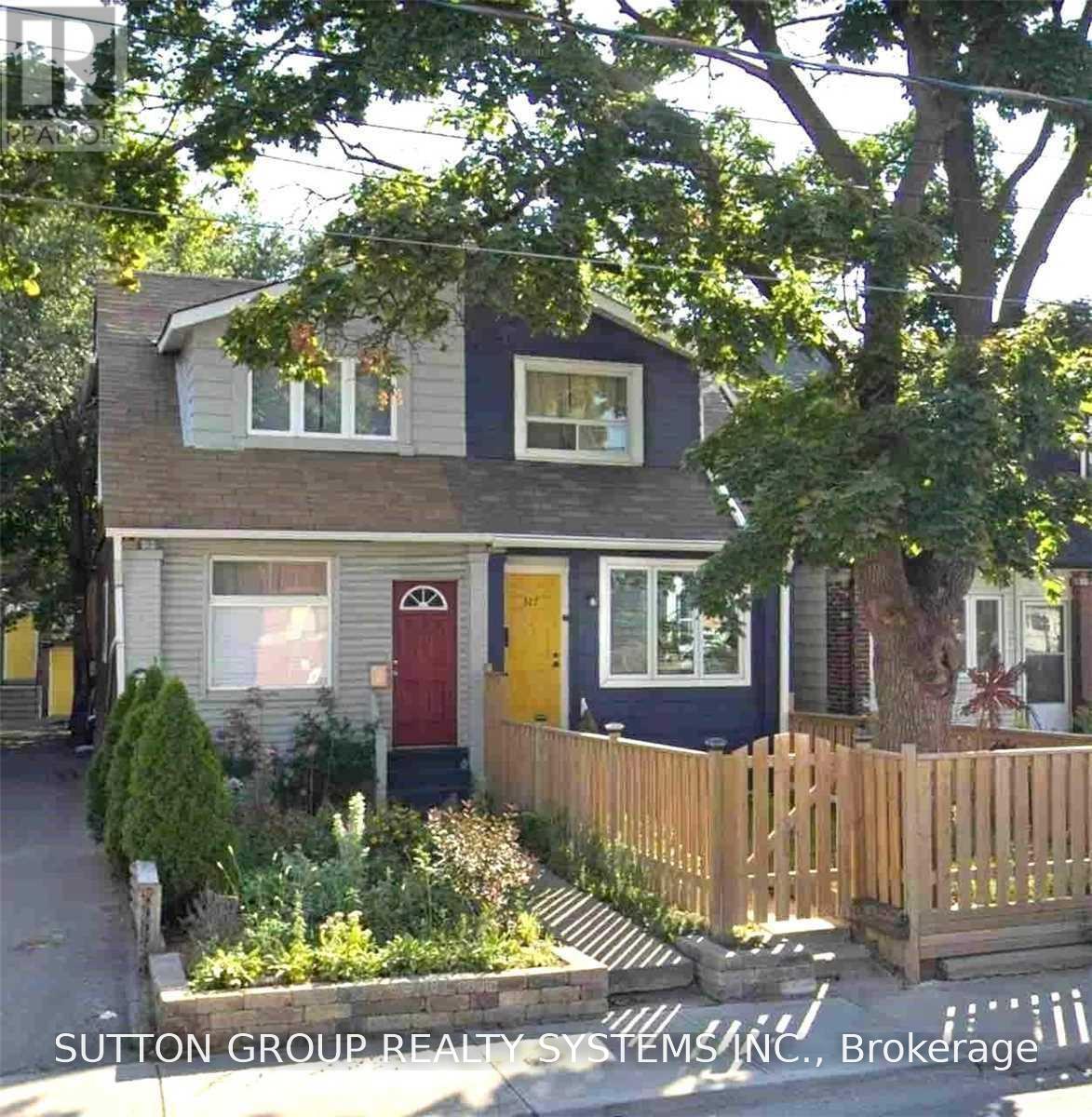 Bsmt - 327 Coxwell (basement) Avenue Property Photo 1