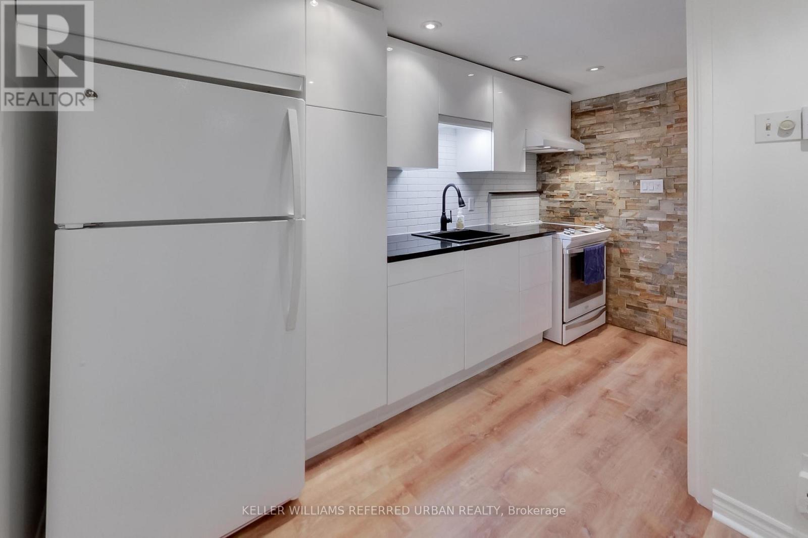 22 - 1666 QUEEN STREET E Property Photo 1