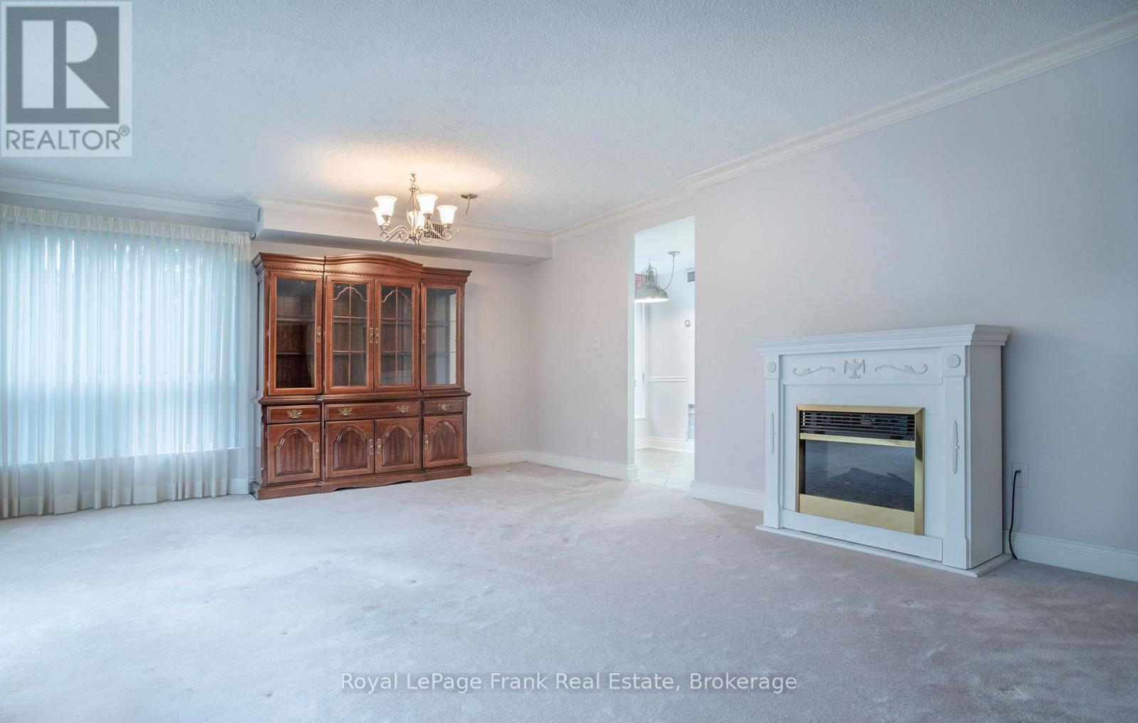 213 - 712 Rossland Road E Property Photo 9