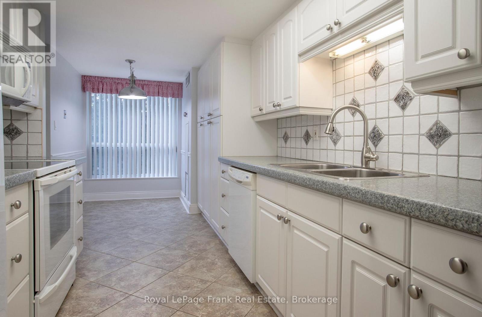 213 - 712 Rossland Road E Property Photo 14