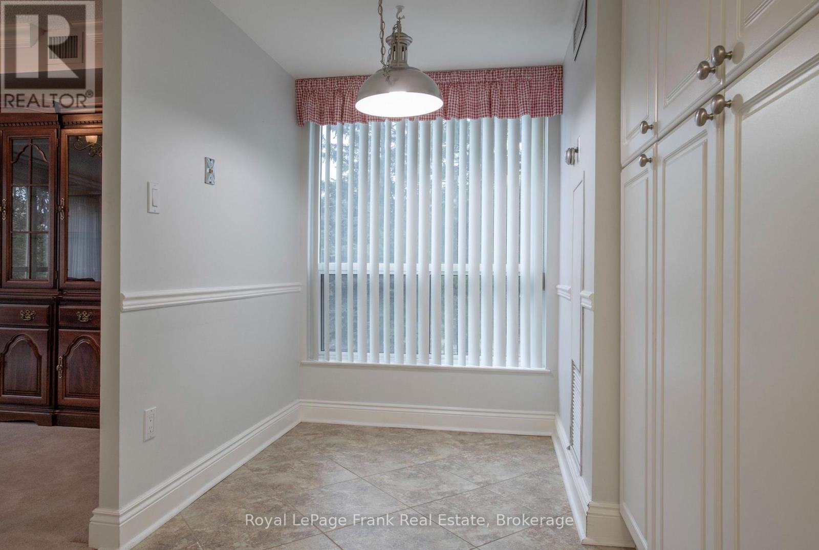 213 - 712 Rossland Road E Property Photo 15
