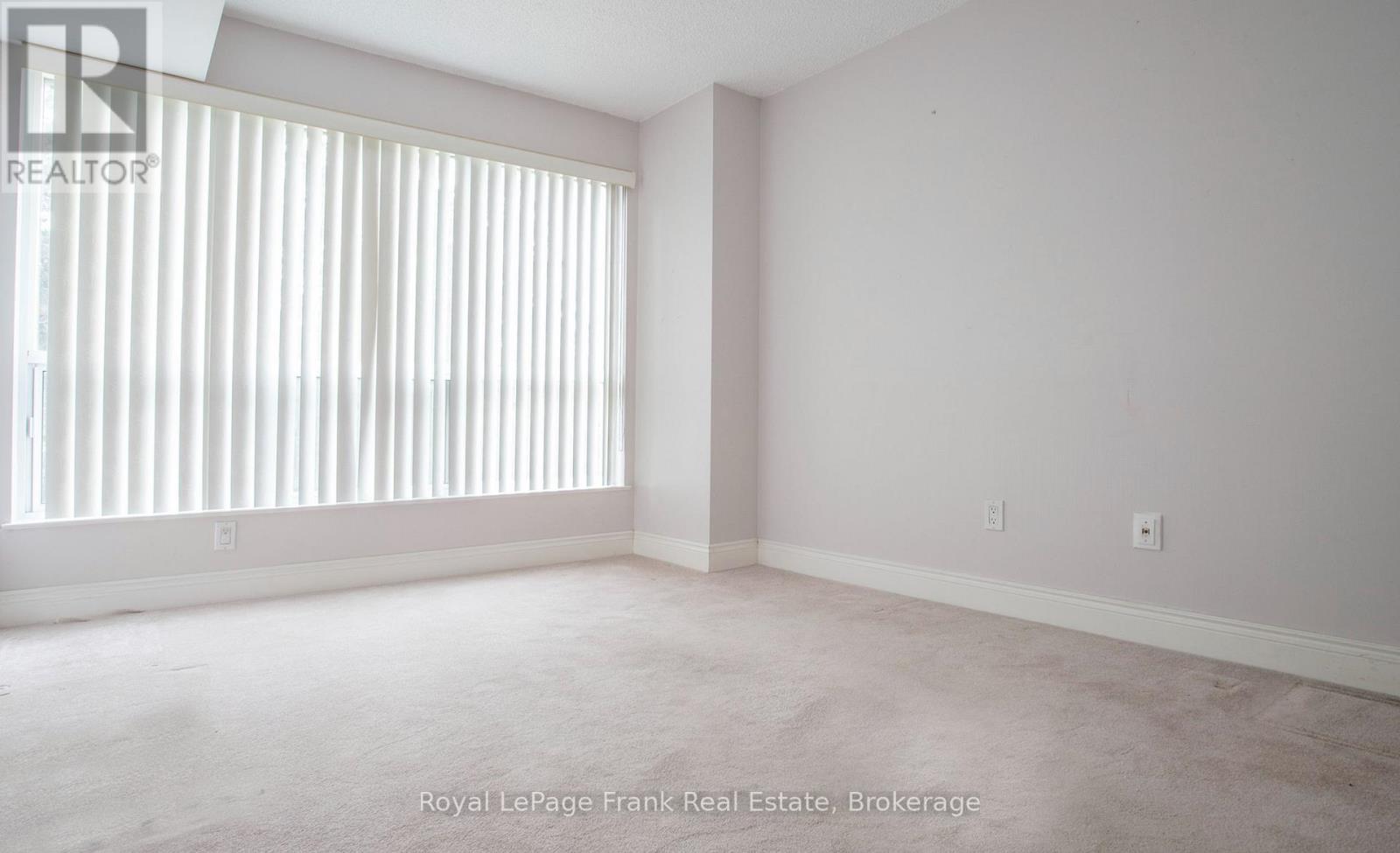 213 - 712 Rossland Road E Property Photo 17