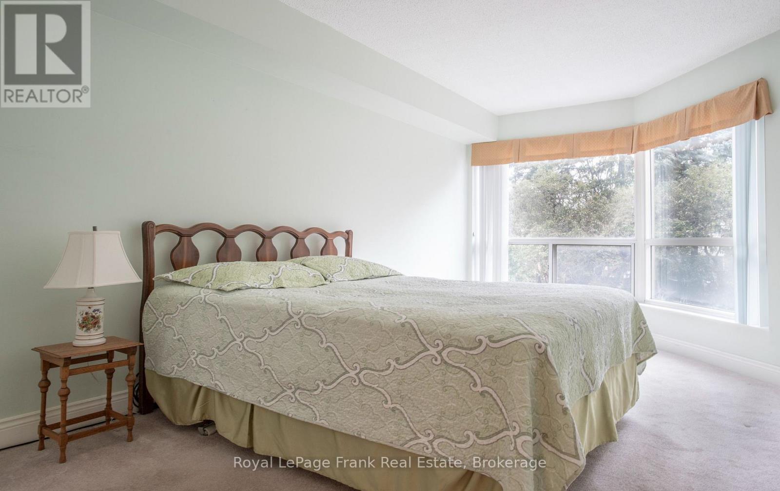 213 - 712 Rossland Road E Property Photo 18