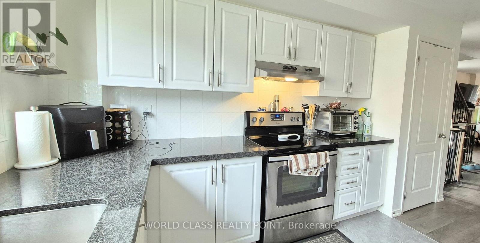 # 222 - 2458 Rosedrop Path Property Photo 2