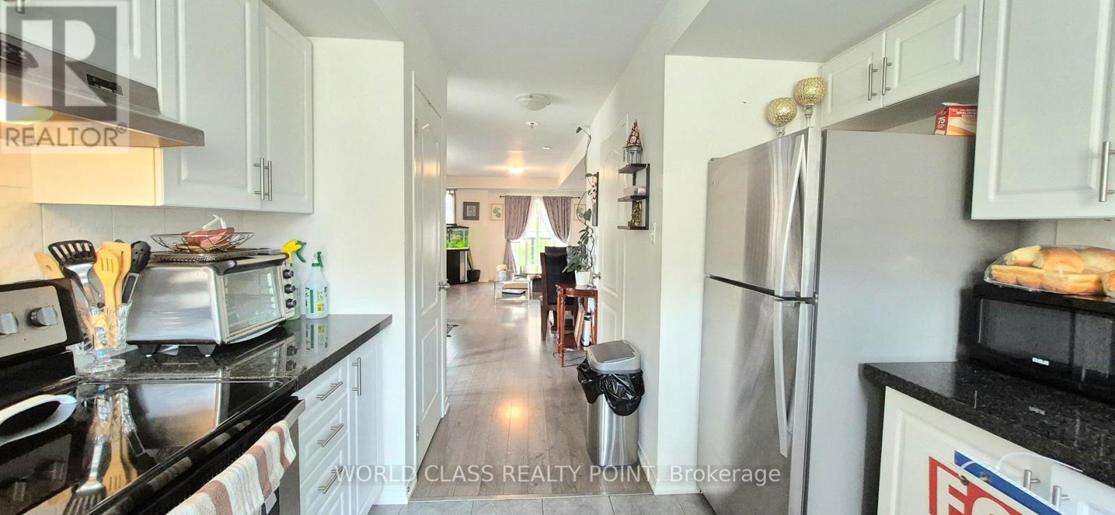 # 222 - 2458 Rosedrop Path Property Photo 4