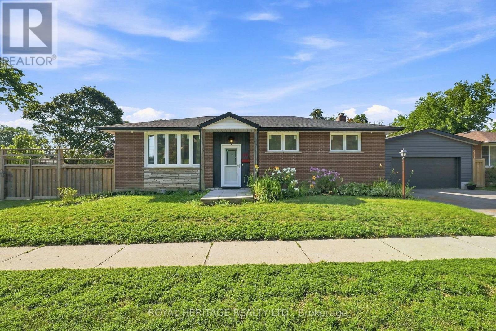 471 Rossland Road E Property Photo 1