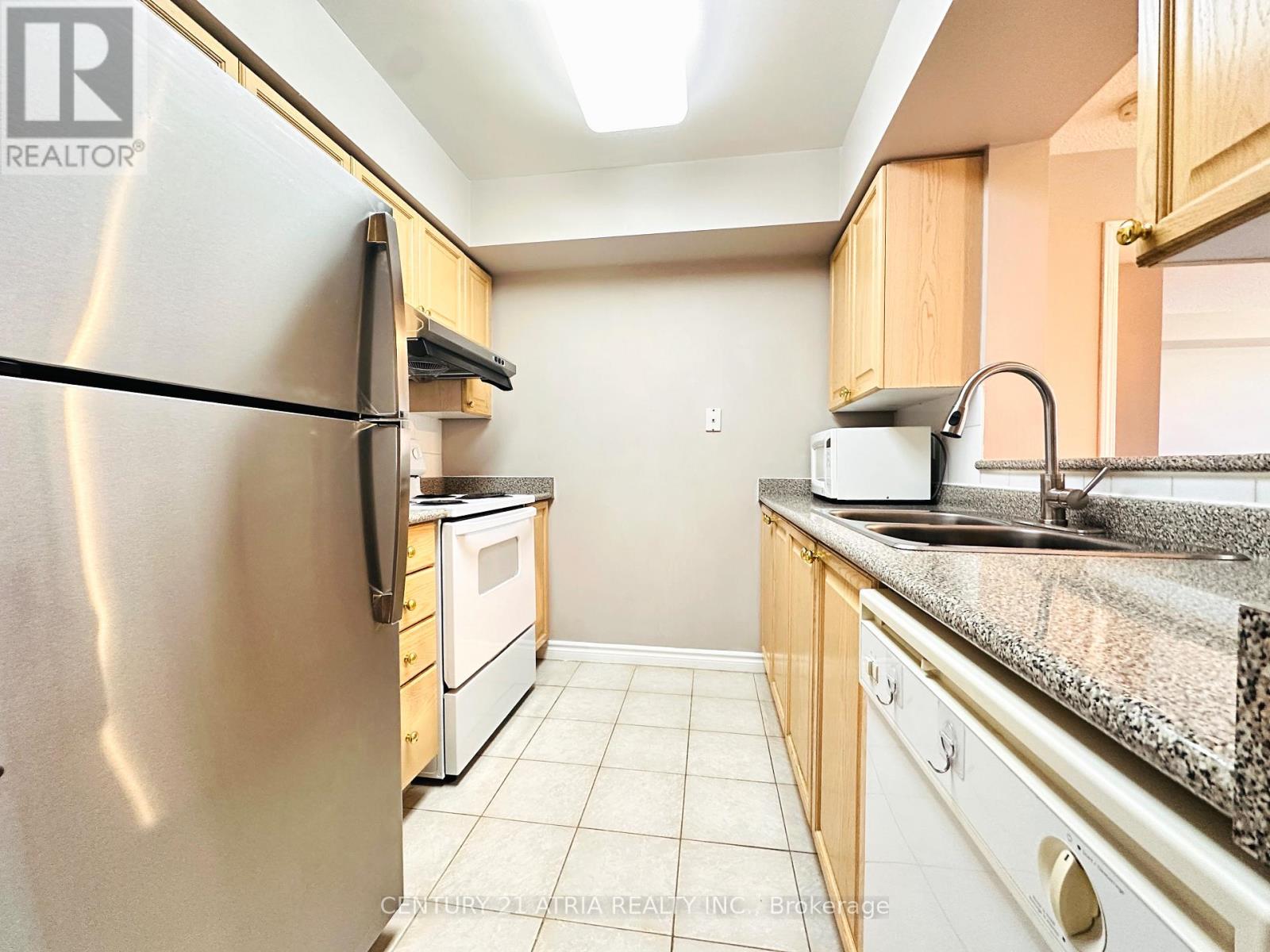 211 - 3088 Kennedy Road Property Photo 2