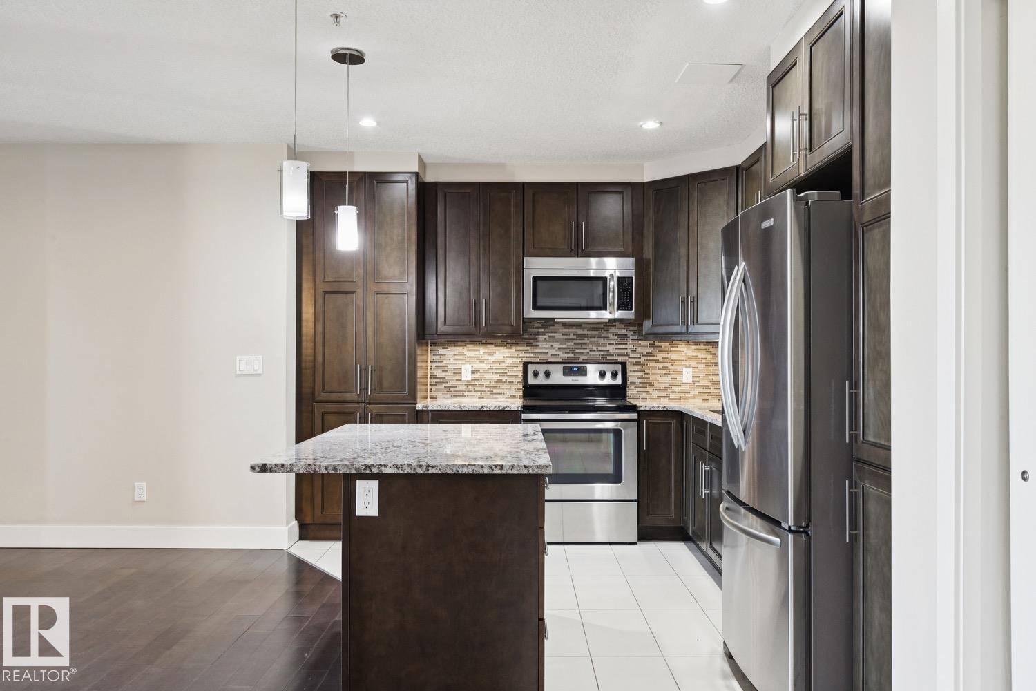 #208 1350 Windermere Wy Sw Property Photo 4