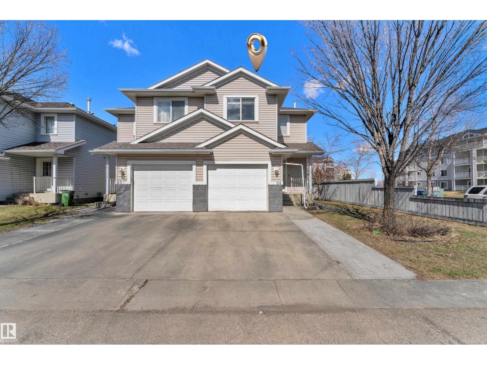 #64 4350 23 ST NW Property Photo 1
