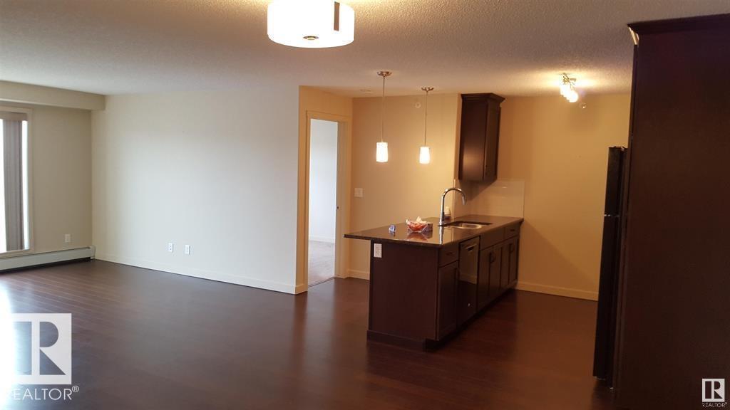 #437 6076 Schonsee Wy Nw Property Photo 6