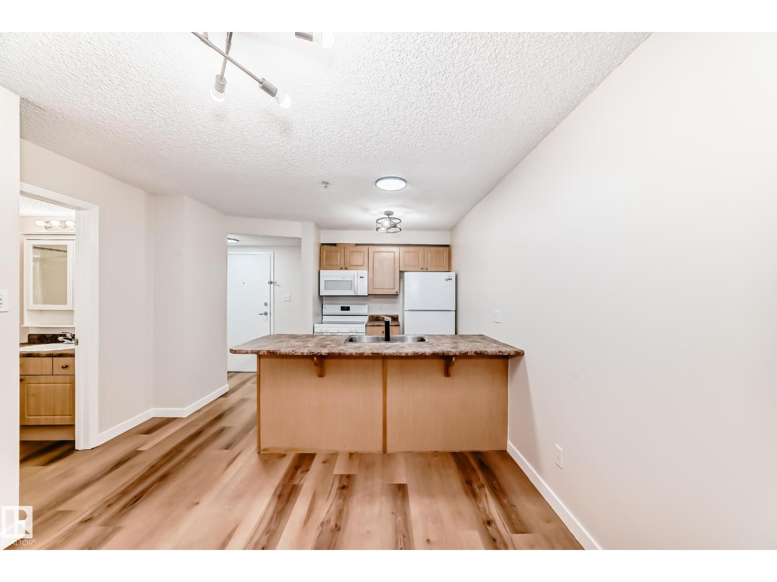 #108 12838 65 St Nw Property Photo 3