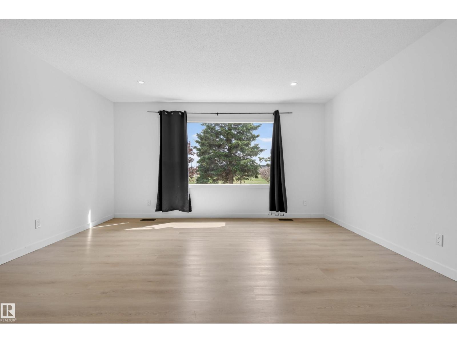 7304/7306 78 Av Nw Property Photo 3