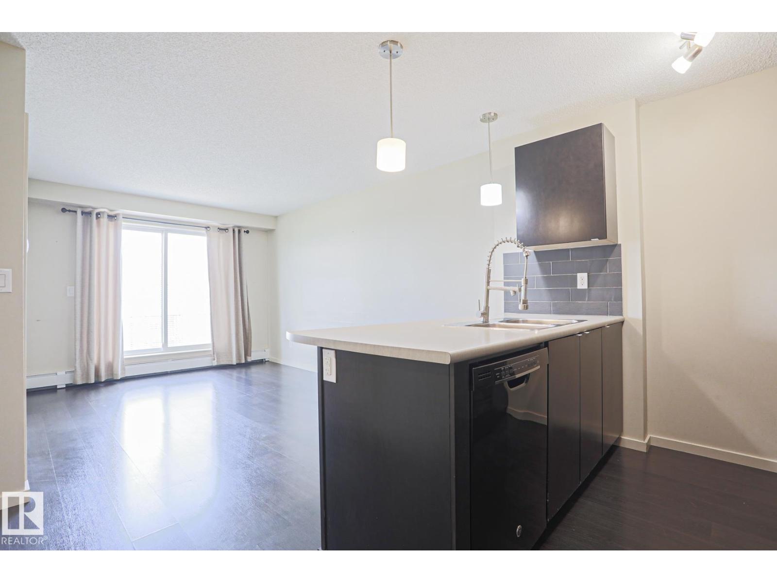 #411 3353 16a Av Nw Property Photo 22
