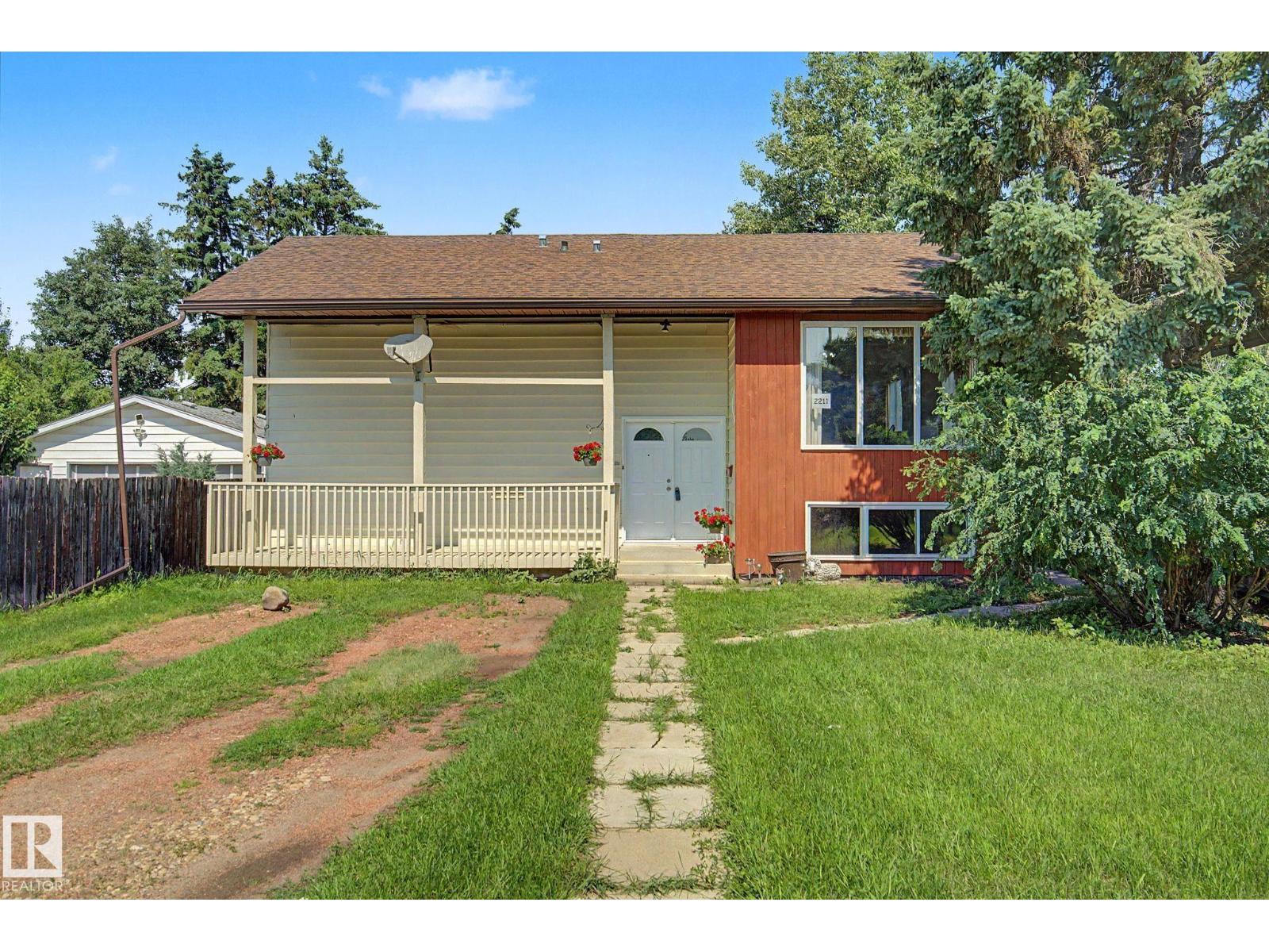 2211 MILLBOURNE RD W NW Property Photo 1