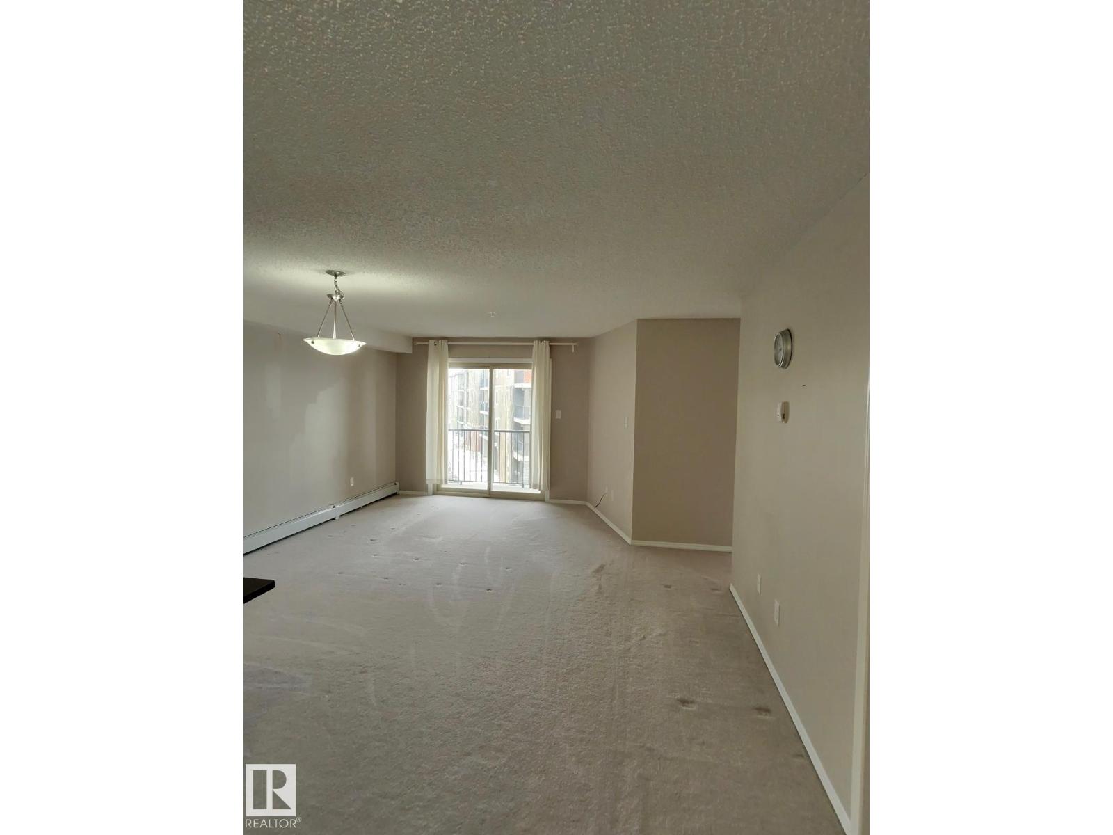#303 1060 Mcconachie Bv Nw Property Photo 2