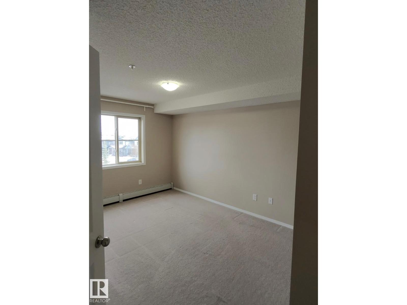 #303 1060 Mcconachie Bv Nw Property Photo 3