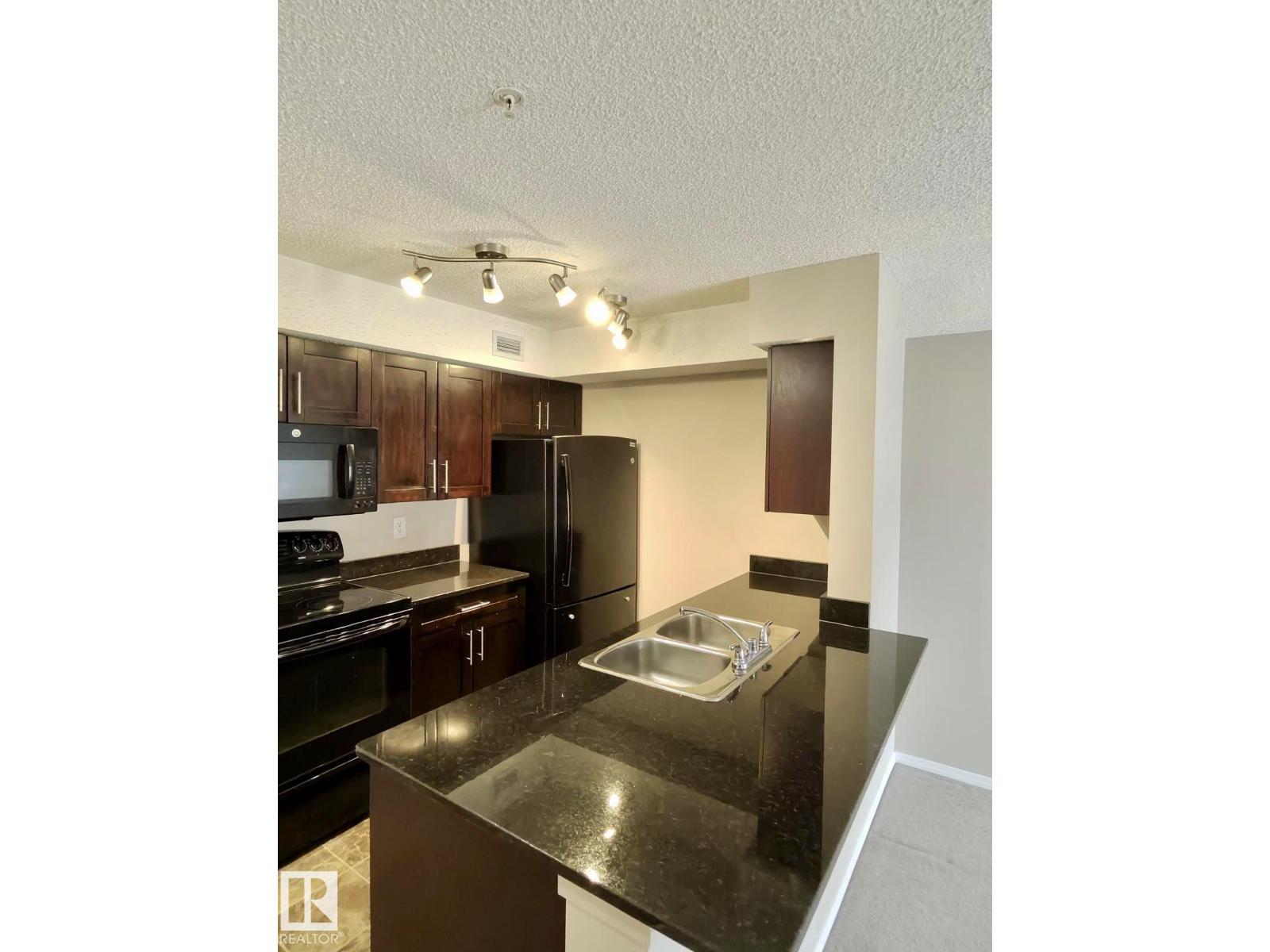 #303 1060 Mcconachie Bv Nw Property Photo 4