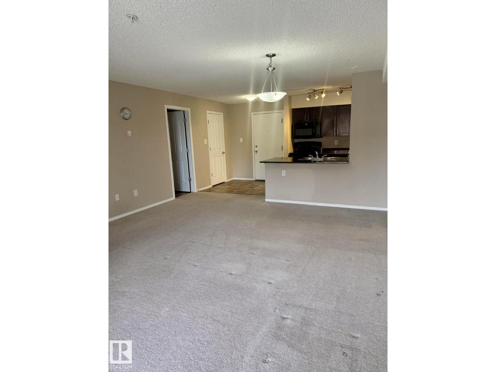 #303 1060 Mcconachie Bv Nw Property Photo 7