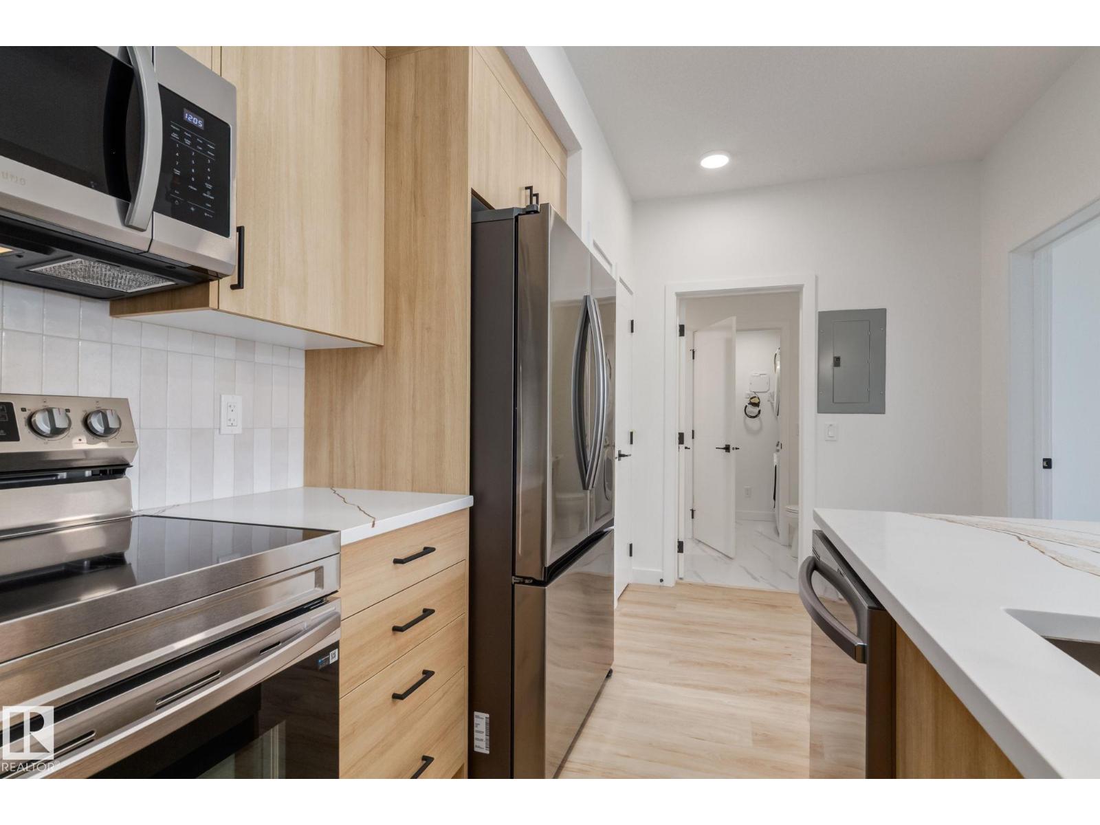 #1 16231 19 Av Sw Property Photo 8