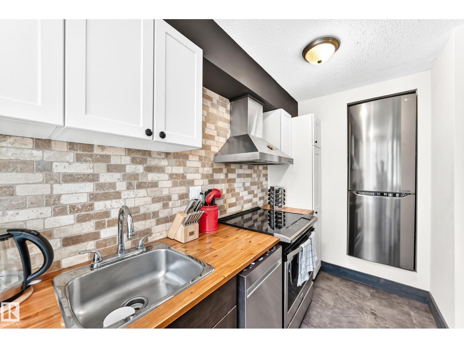 #230 10160 114 St Nw Property Photo 1