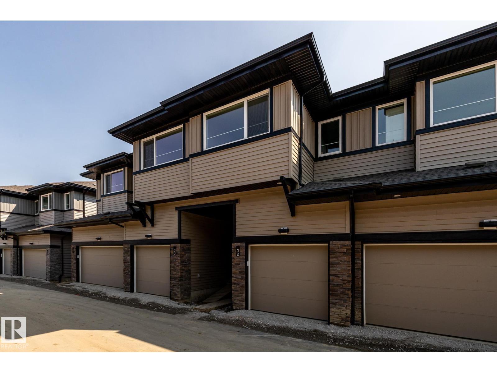 #32 7020 Keswick Cm Sw Property Photo 1