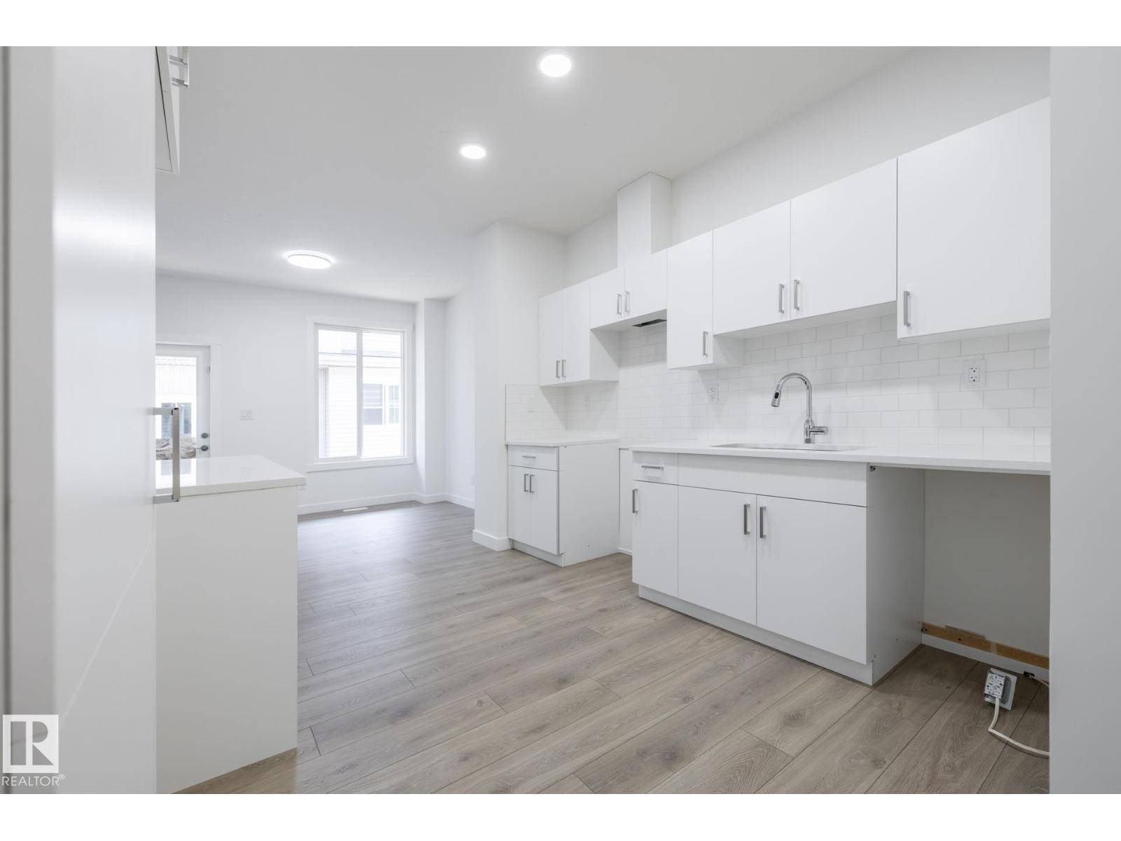 #32 7020 Keswick Cm Sw Property Photo 2