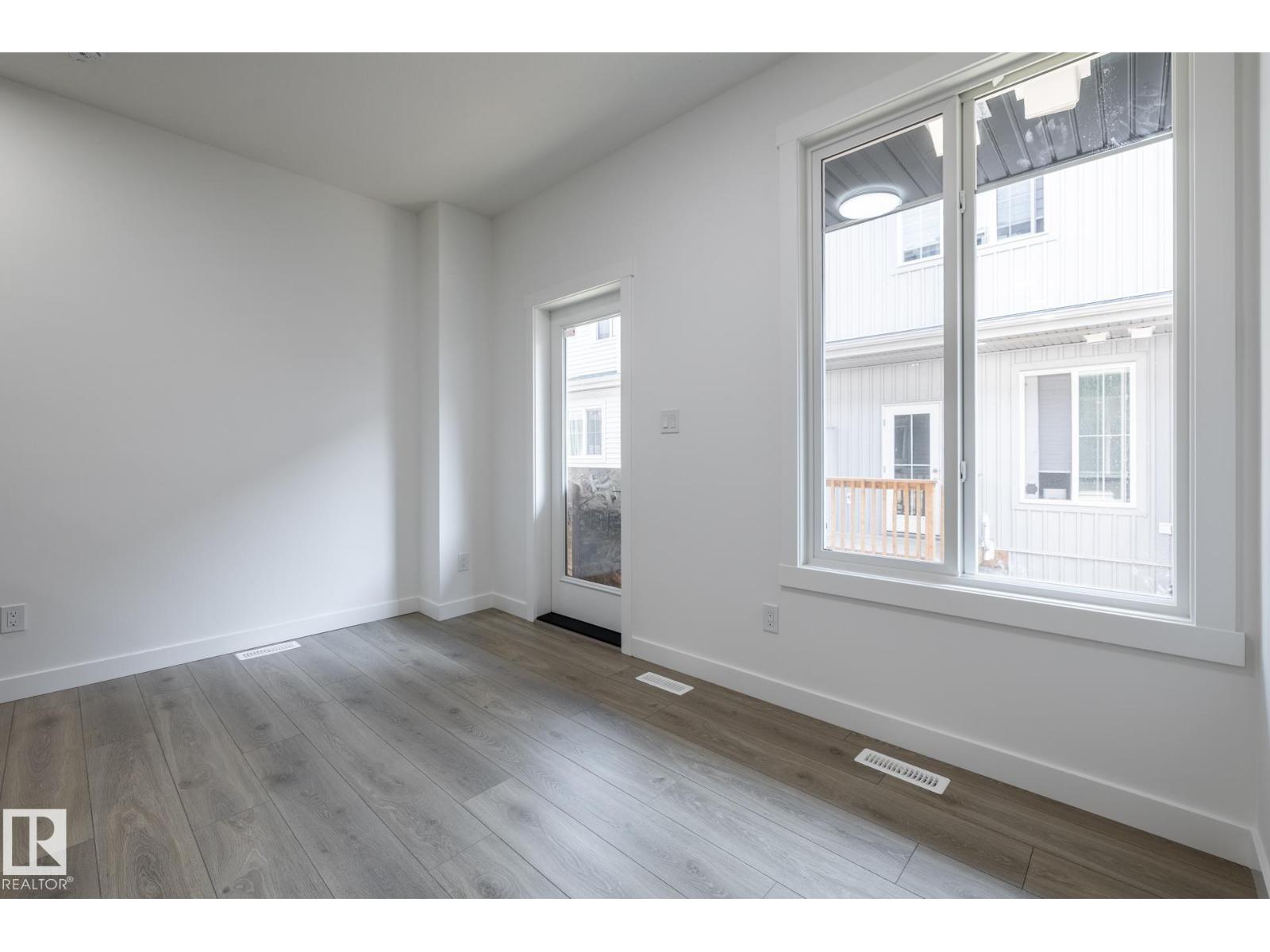 #32 7020 Keswick Cm Sw Property Photo 5