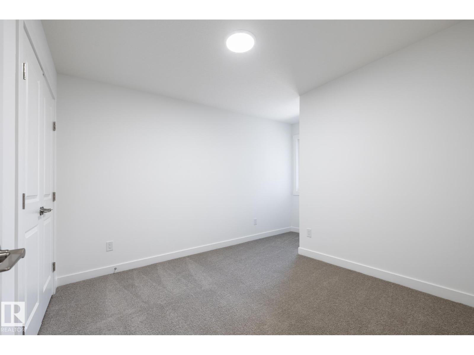 #32 7020 Keswick Cm Sw Property Photo 7