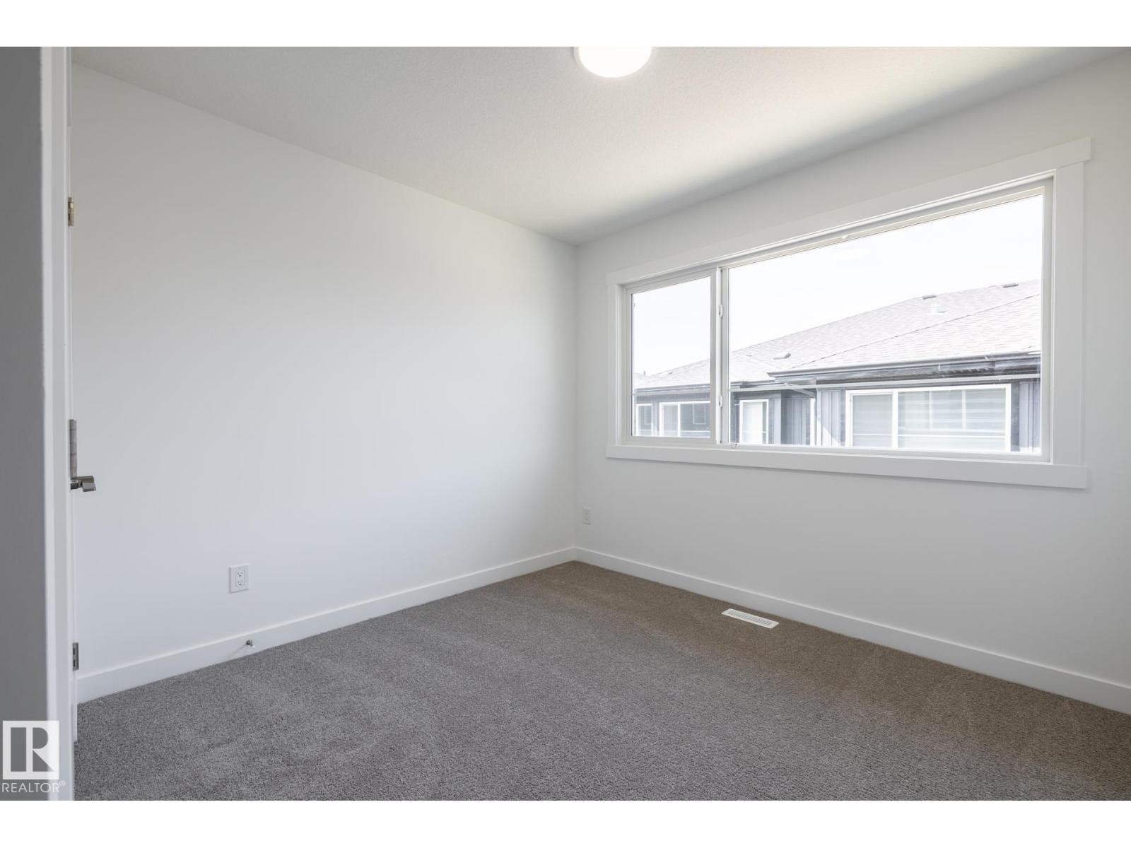 #32 7020 Keswick Cm Sw Property Photo 8