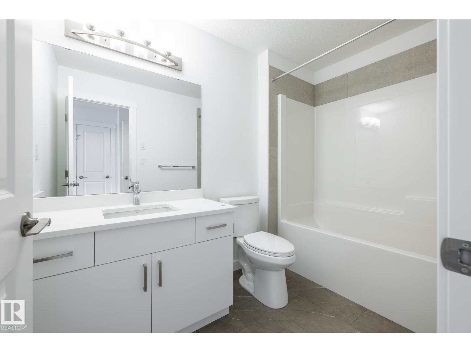 #32 7020 Keswick Cm Sw Property Photo 9