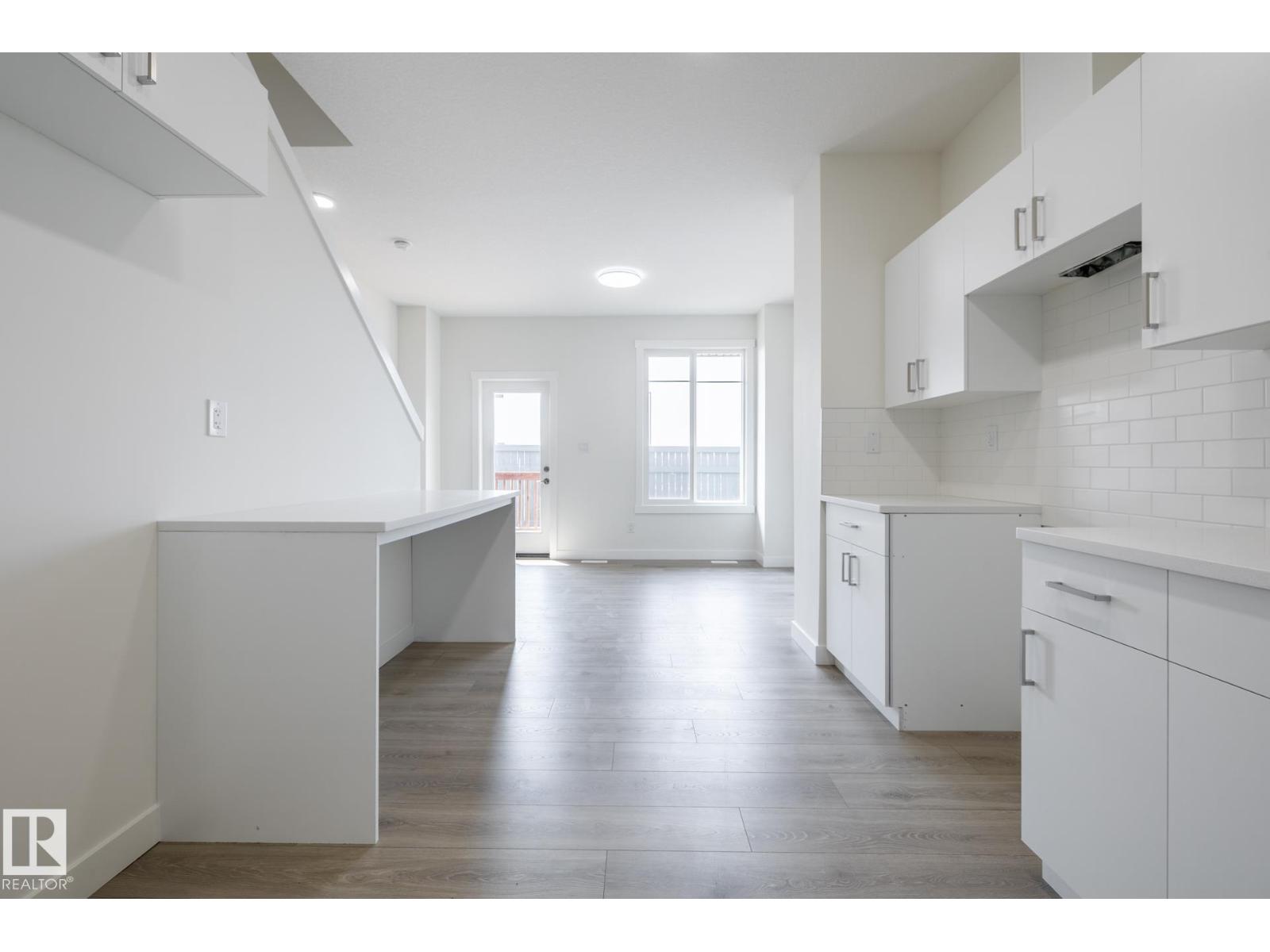 #24 7020 Keswick Cm Sw Property Photo 3