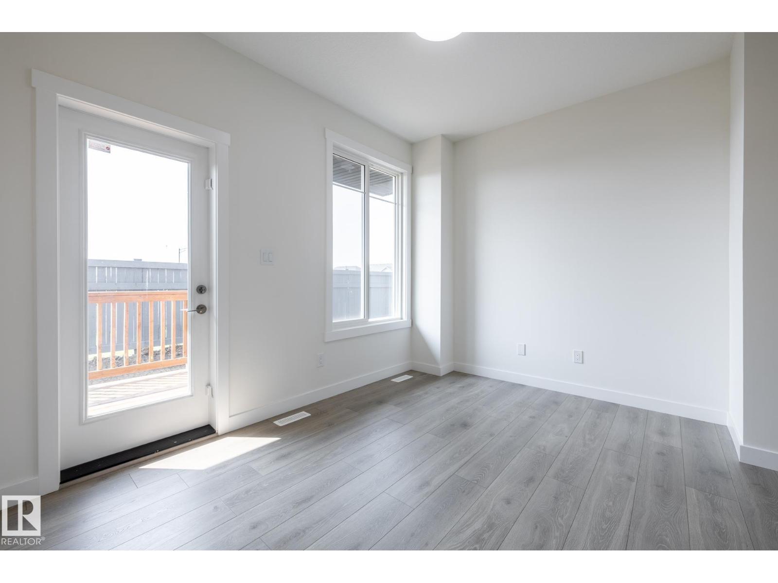 #24 7020 Keswick Cm Sw Property Photo 6